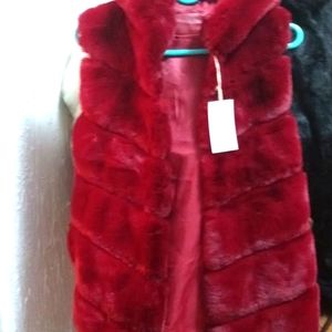 FUR HOODED VEST....